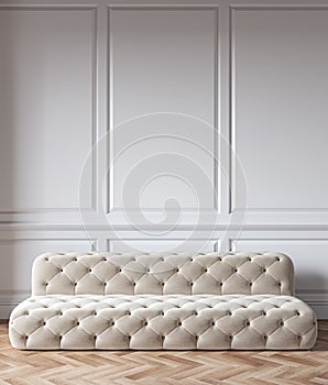 Classic white interior with capitone chester sofa, mouldings, wooden floor.