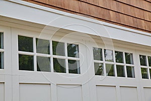Classic White Windows and Cedar Shake Siding Detail photo