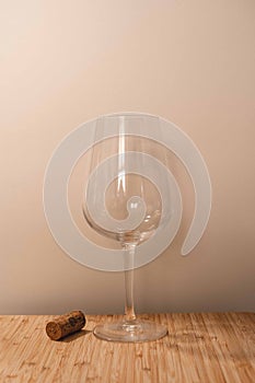 Classic wineglass with white background and wood. Prefect wineglass for red or white wine. photo
