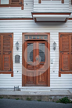 Classic Wood Door with Traditional Shutters