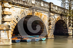 Classic wooden boats docked on the river in Oxford - 2