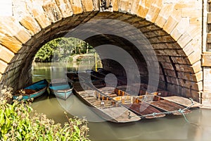 Classic wooden boats docked on the river in Oxford - 7
