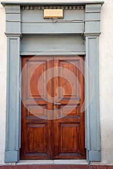 Classic wooden entrance brown doors