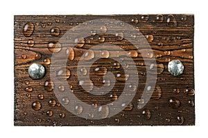 Classic wooden frame with iron rivets in drops of rainwater, on a white background