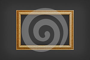 Classic wooden frame isolated on black wall