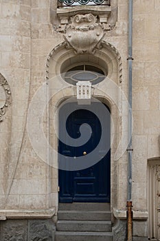 classic wooden front door of classical restored house entrance dark house