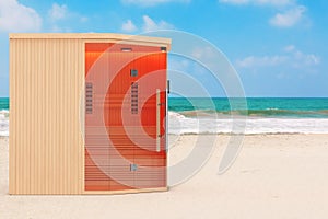 Classic Wooden Infrarered Finnish Sauna Cabin on the Ocean or Sea Sand Beach. 3d Rendering
