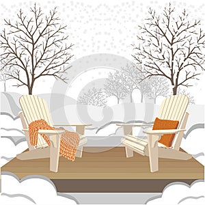 Classic wooden outdoor chairs with chunky knit plaid and pillow. Winter garden or park landscape