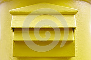 Classic yellow mail box detail. Postbox. Postal service. Communication