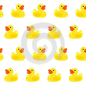 Classic yellow rubber duck with red beak isolated on white background. Seamless pattern. Toy animal. Design element for packaging