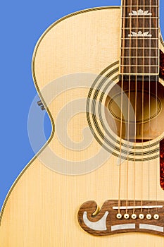 Classical acoustic guitar fragment with six strings and soundboard rosette