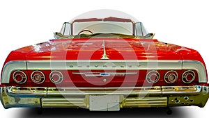 Classical American Vintage car Chevrolet Impala 1964. Back view. White background