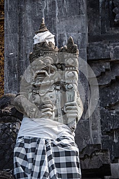 Classical Balinese stone sculpture on the grounds of the \
