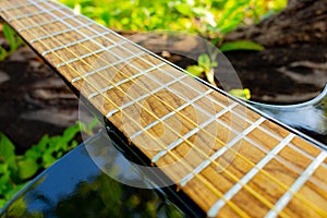 classical black guitar diagonally close-up photo