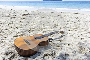 A classical guitar in the beach