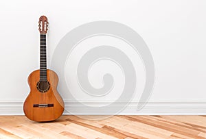 Classical guitar in an empty room