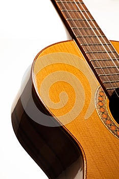 Classical guitar isolated on a white background close up