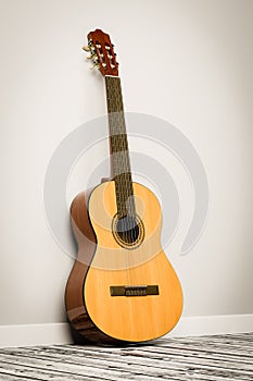 Classical Guitar Leaning Against the Wall of a Room