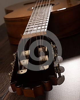 Classical guitar machine head and fretboard close up