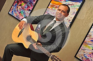 Classical guitar player Dmytro Manko performig musical set