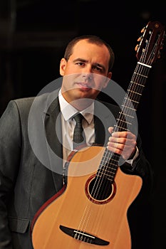 Classical guitar player Dmytro Manko performig musical set