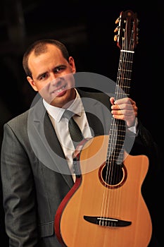 Classical guitar player Dmytro Manko performig musical set