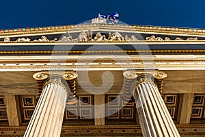 Classical marble pillars detail on the facade of a building