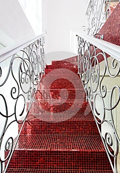 Classical mosaic stairs with beautiful handrail