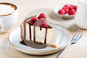 Classical New York Cheesecake Slice With Chocolate Sauce