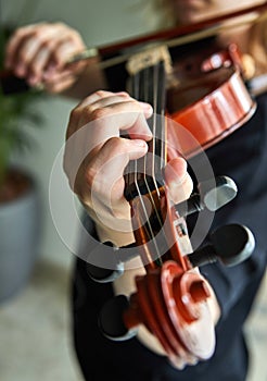 Classical player hands. Details of violin playing