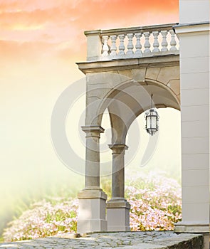 Classical portal with columns and garden