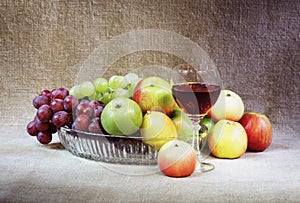 Classical still-life with fruit and wineglass