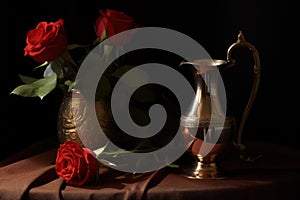 Classical still life with roses in a messing vase
