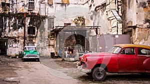 Classical Vintage Cars Parked in an Old Cuban Building