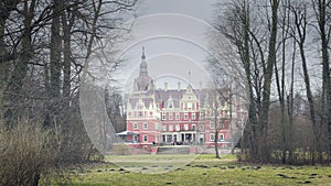 Classicist castle with yellow, red facade