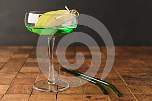 Classik Apple martini - appletini, cold summer cocktail with gin, apple liqueur, dry vermouth and