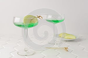 Classik Apple martini - appletini, cold summer cocktail with gin, apple liqueur, dry vermouth and