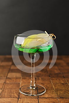 Classik Apple martini - appletini, cold summer cocktail with gin, apple liqueur, dry vermouth and
