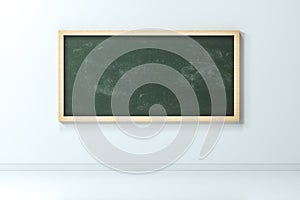 A classroom with a blackboard in the front of the room, 3d rendering