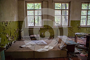 Classroom with desks in the kindergarten at the abandoned village Kopachi near Chernobyl