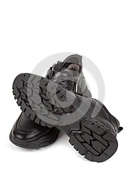 Classsic new men& x27;s black winter leather fur boots isolated on white background