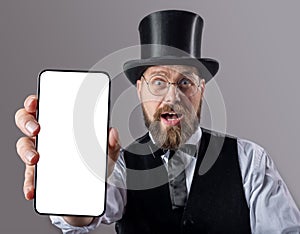 Classy gentleman with smartphone