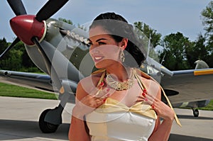 Classy woman with British WWII aircraft