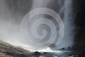 Clattering water of french Cascade du Rouget in the Alps