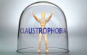 Claustrophobia can separate a person from the world and lock in an isolation that limits - pictured as a human figure locked