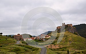 General view of the village of Clavijo with its medieval Church and Castle. photo