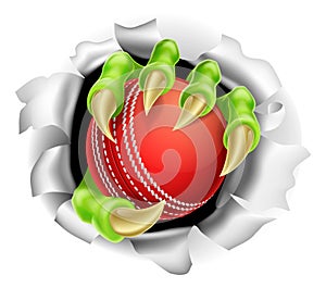 Claw with Cricket Ball Breaking out Of Background