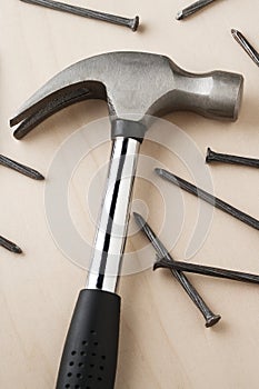 Claw hammer and nails