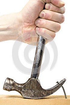 Pulling a nail out of a plank