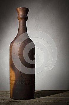 Clay bottle with wine